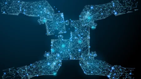 Abstract image of hands putting together puzzle